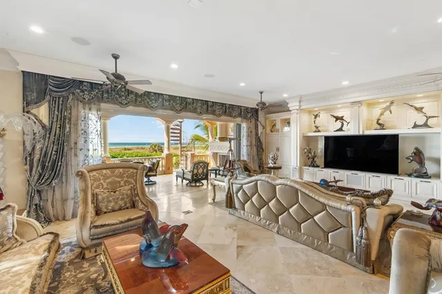a kitchen with lots of counter top space and chairs