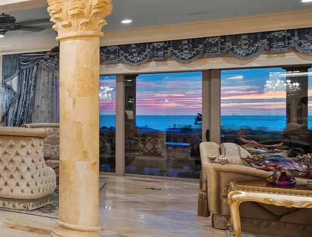 a bed room with a bed and a chandelier