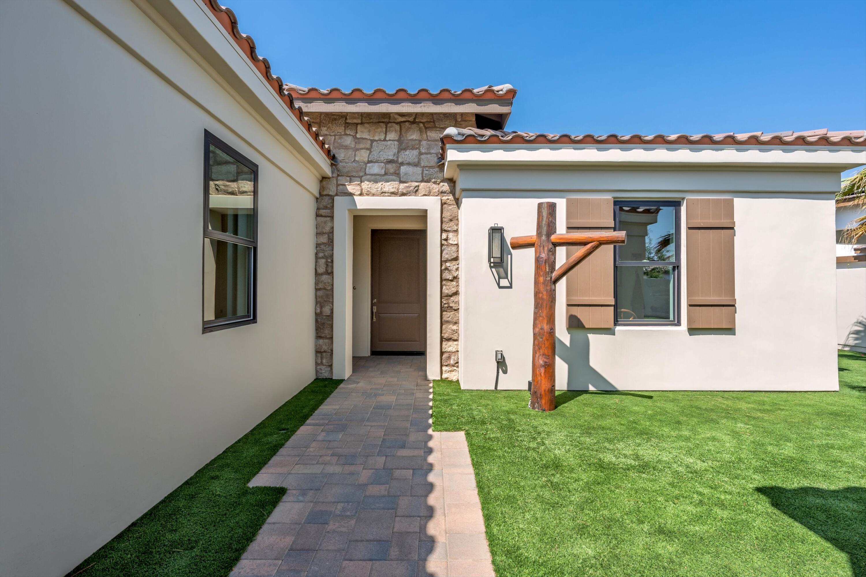 58892 Marbella La Quinta, CA 92253 - Photo 39 of 65 a view of a house with backyard