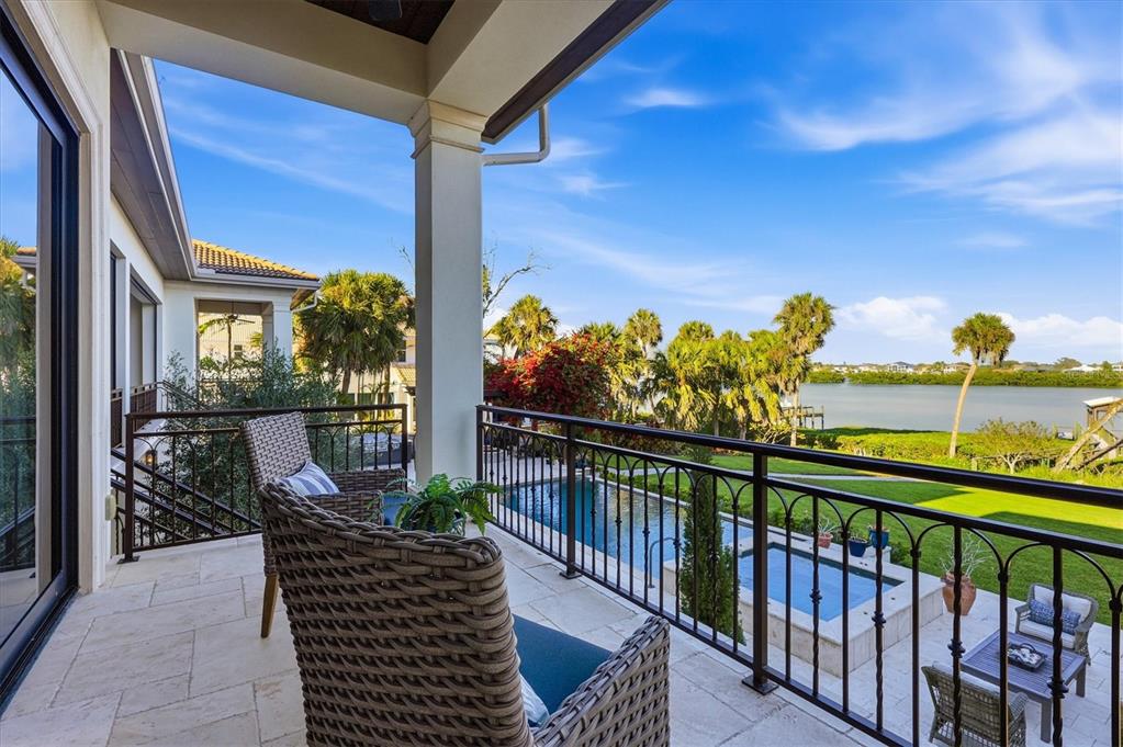 3210 Casey Key Road Nokomis, FL 34275 - Photo 35 of 77 a view of a balcony with chairs