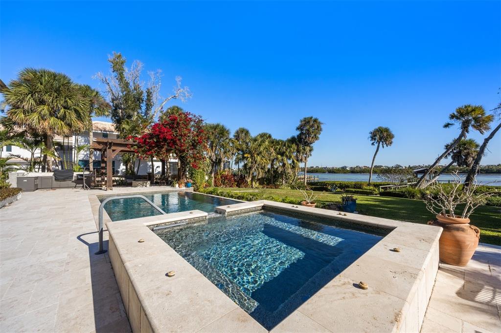 3210 Casey Key Road Nokomis, FL 34275 - Photo 66 of 77 a view of a swimming pool with a patio