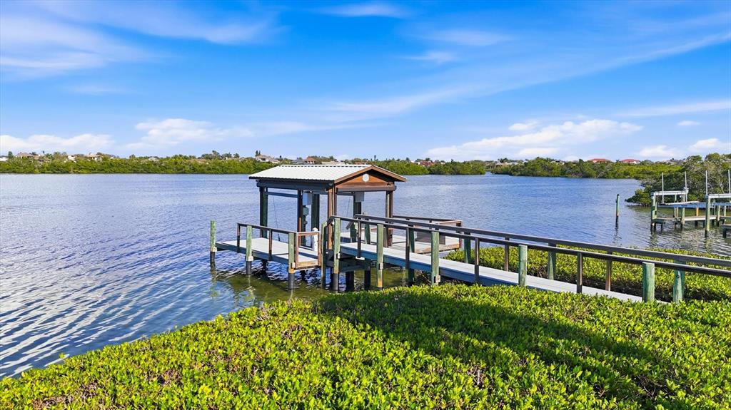3210 Casey Key Road Nokomis, FL 34275 - Photo 69 of 77 a view of a lake with a terrace