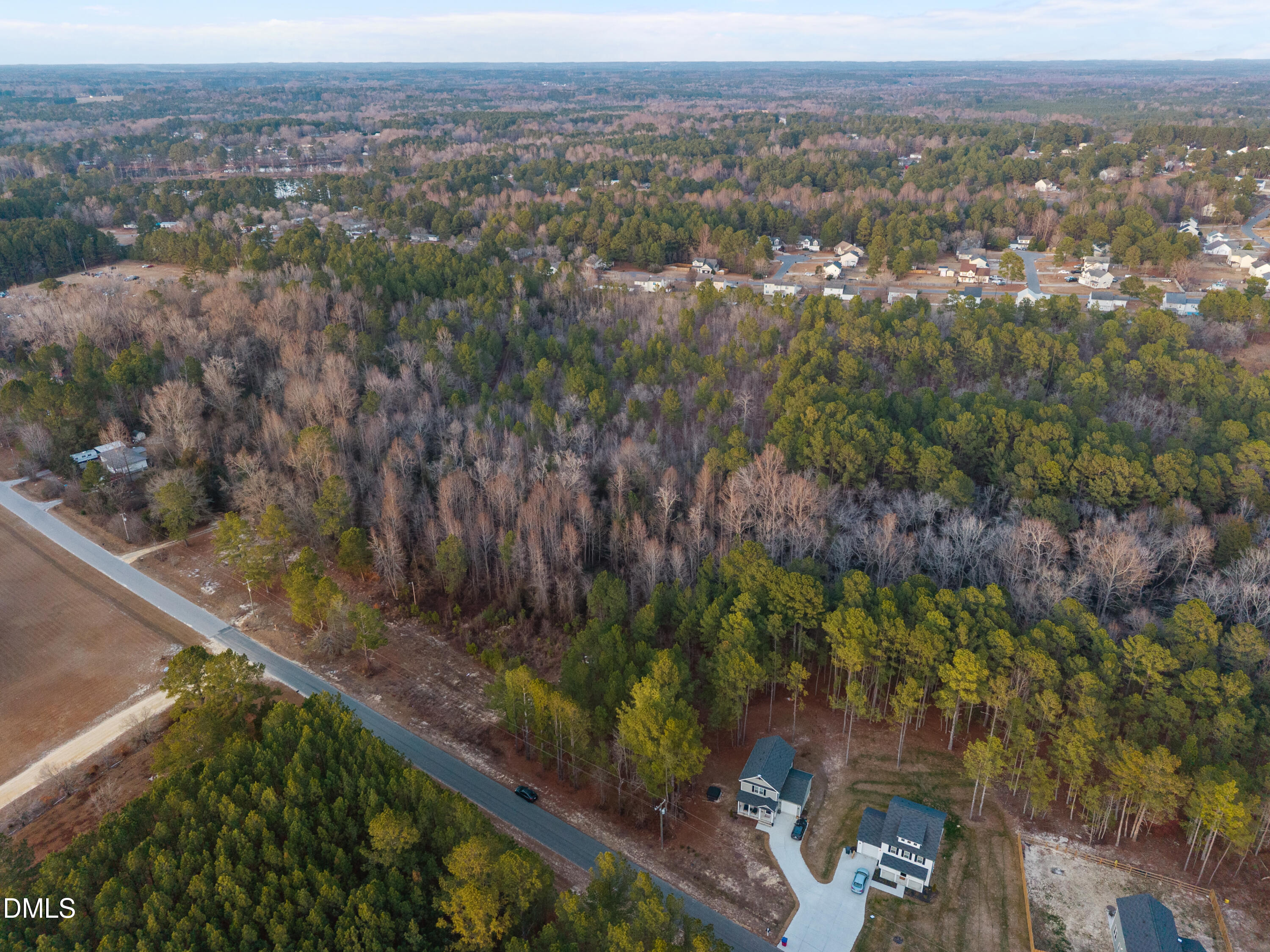 862 Roberts Road Sanford, NC 27332 - Photo 12 of 12 a view of a city with lush green forest