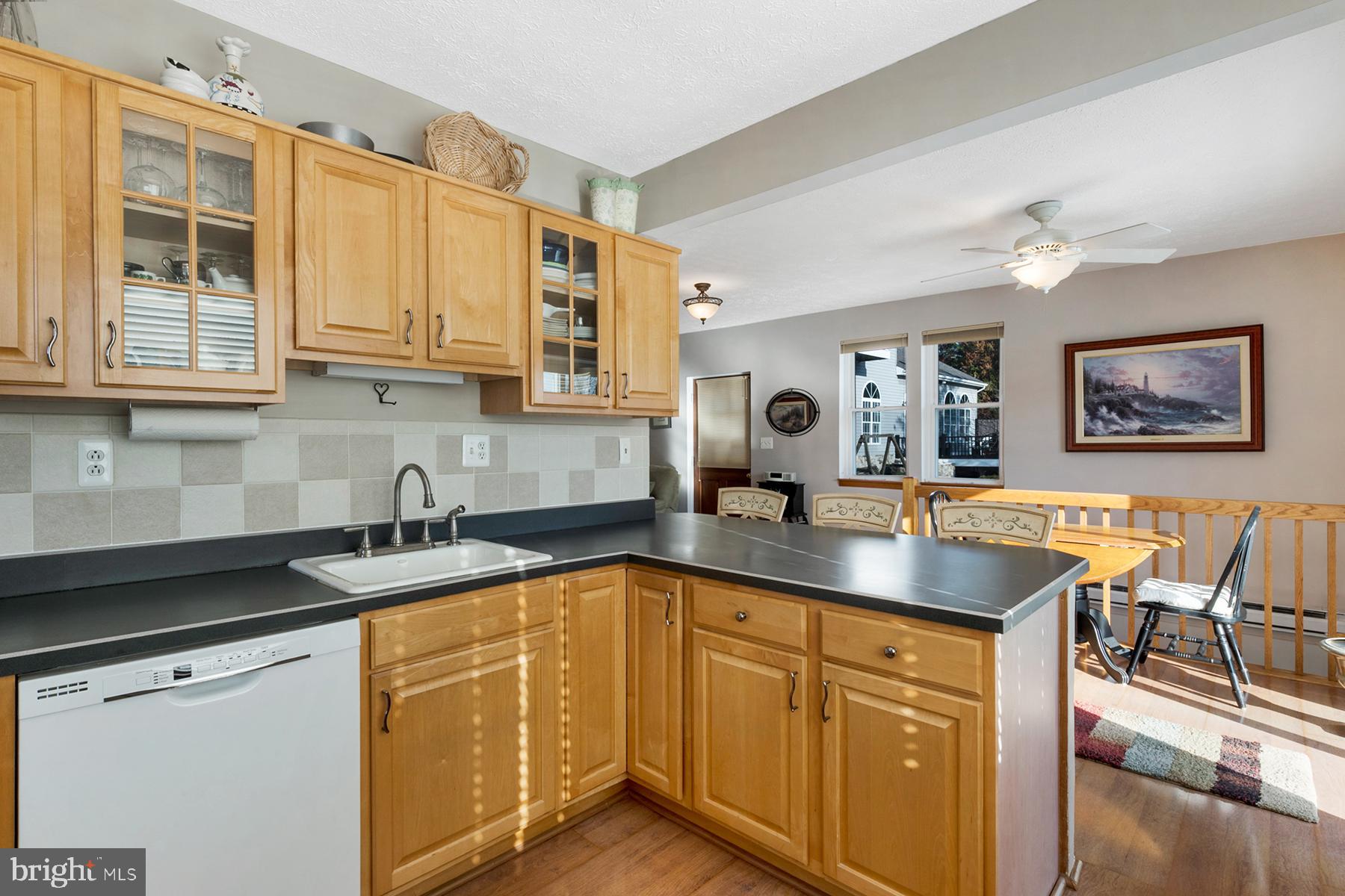 1253 Magothy Road Pasadena, MD 21122 - Photo 13 of 49 There is a breakfast bar & space for a caf table