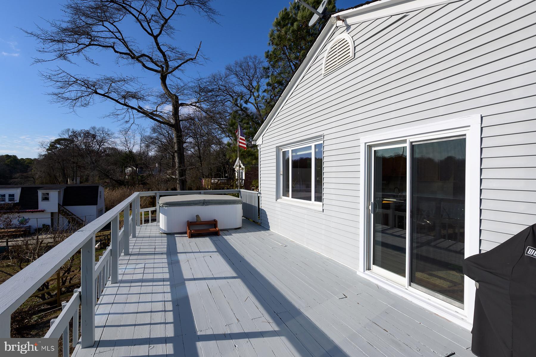 1253 Magothy Road Pasadena, MD 21122 - Photo 15 of 49 There is a deck off the main level with a hottub