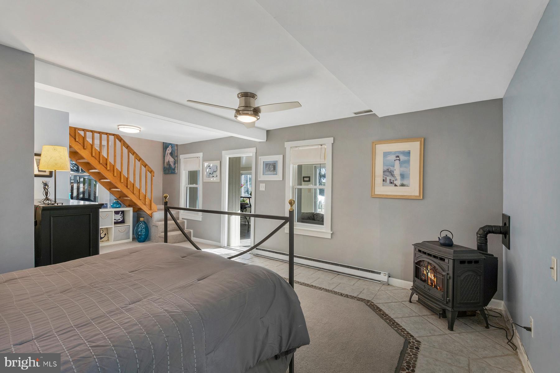 1253 Magothy Road Pasadena, MD 21122 - Photo 25 of 49 The space has a woodstove for extra warmth