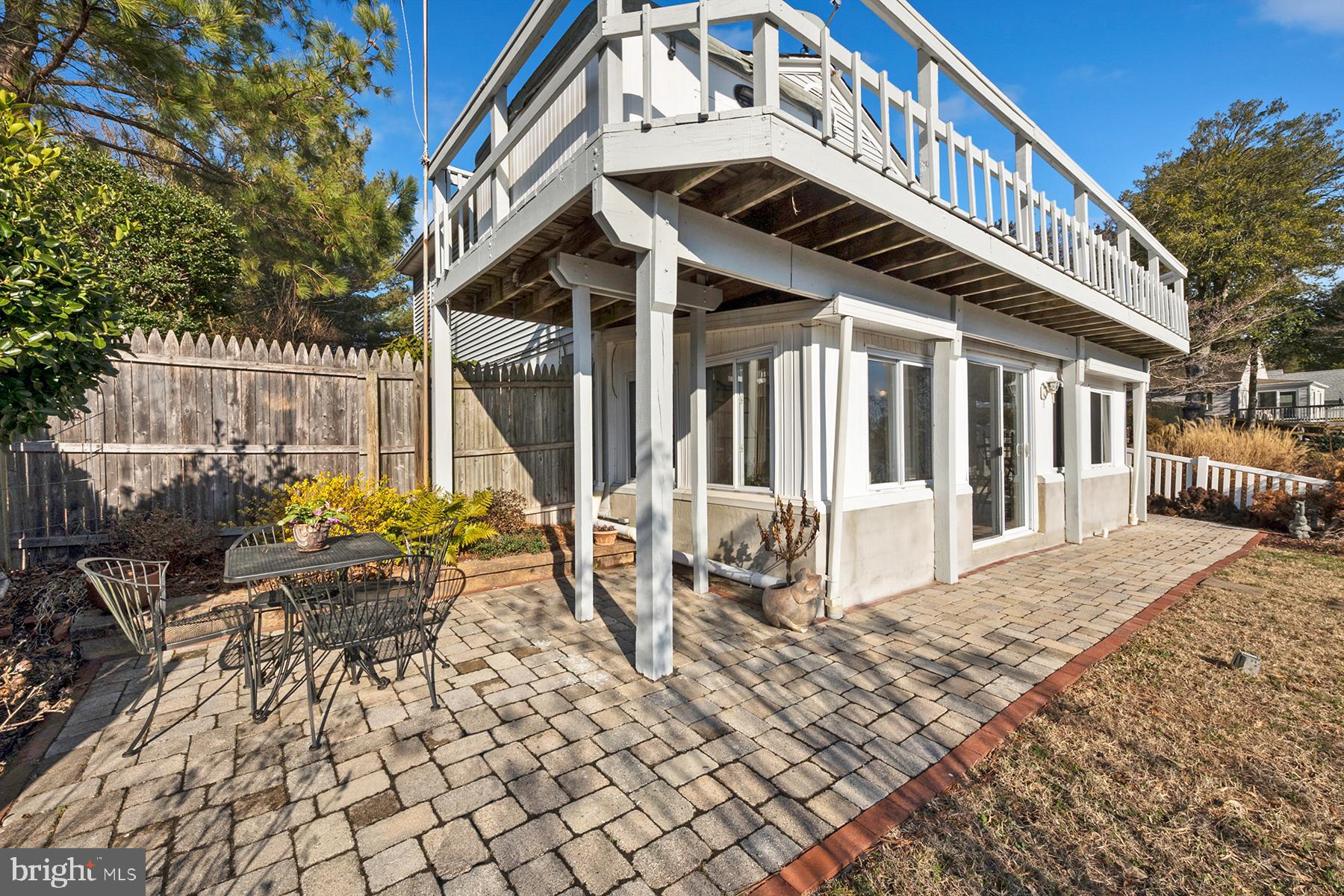 1253 Magothy Road Pasadena, MD 21122 - Photo 34 of 49 The waterside patio and deck above