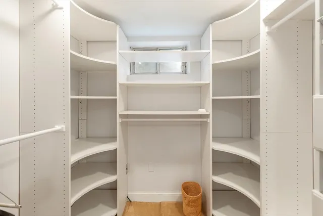 a view of an empty walk in closet