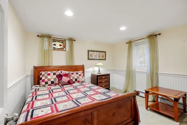 a bedroom with a bed and a closet