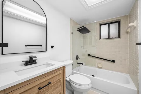 a view of a room with a large window