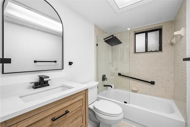 a view of a room with a large window