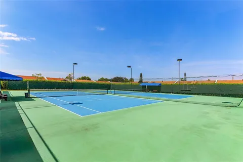 a view of a living room and kitchen