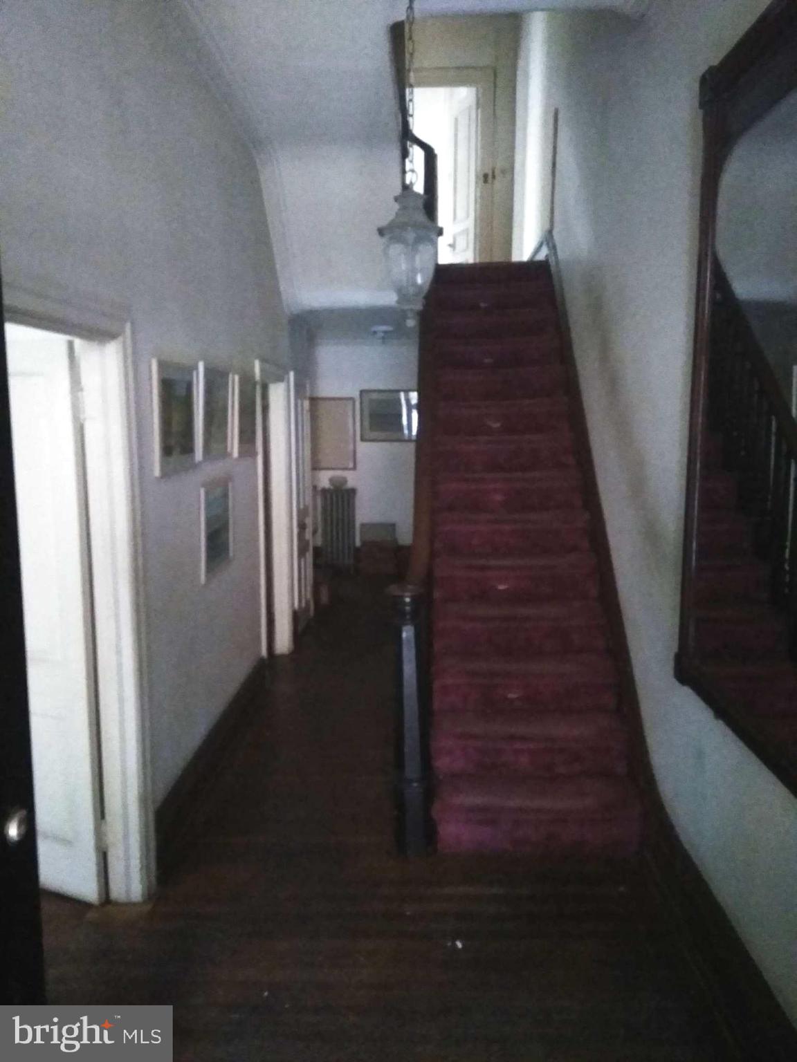 2132 Pine Street Philadelphia, PA 19103 - Photo 2 of 4 a view of entryway and hall with wooden floor