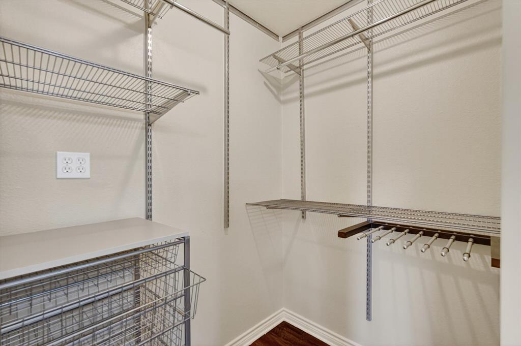2828 Bennett Road Howe, TX 75459 - Photo 25 of 39 a view of a room with racks on the wall