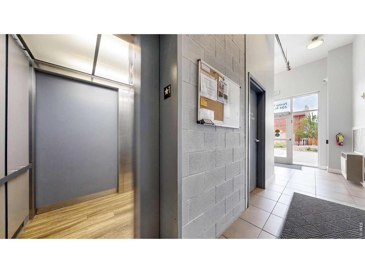 204 Maple Street, Unit 403 Fort Collins, CO 80521 - Photo 22 of 30 Elevator at Main Entrance