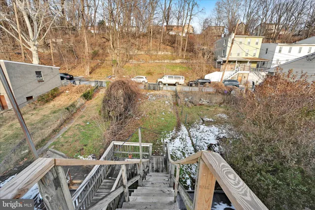 a view of roof deck with patio