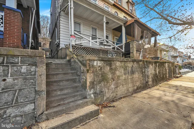 a view of entryway with brick walls