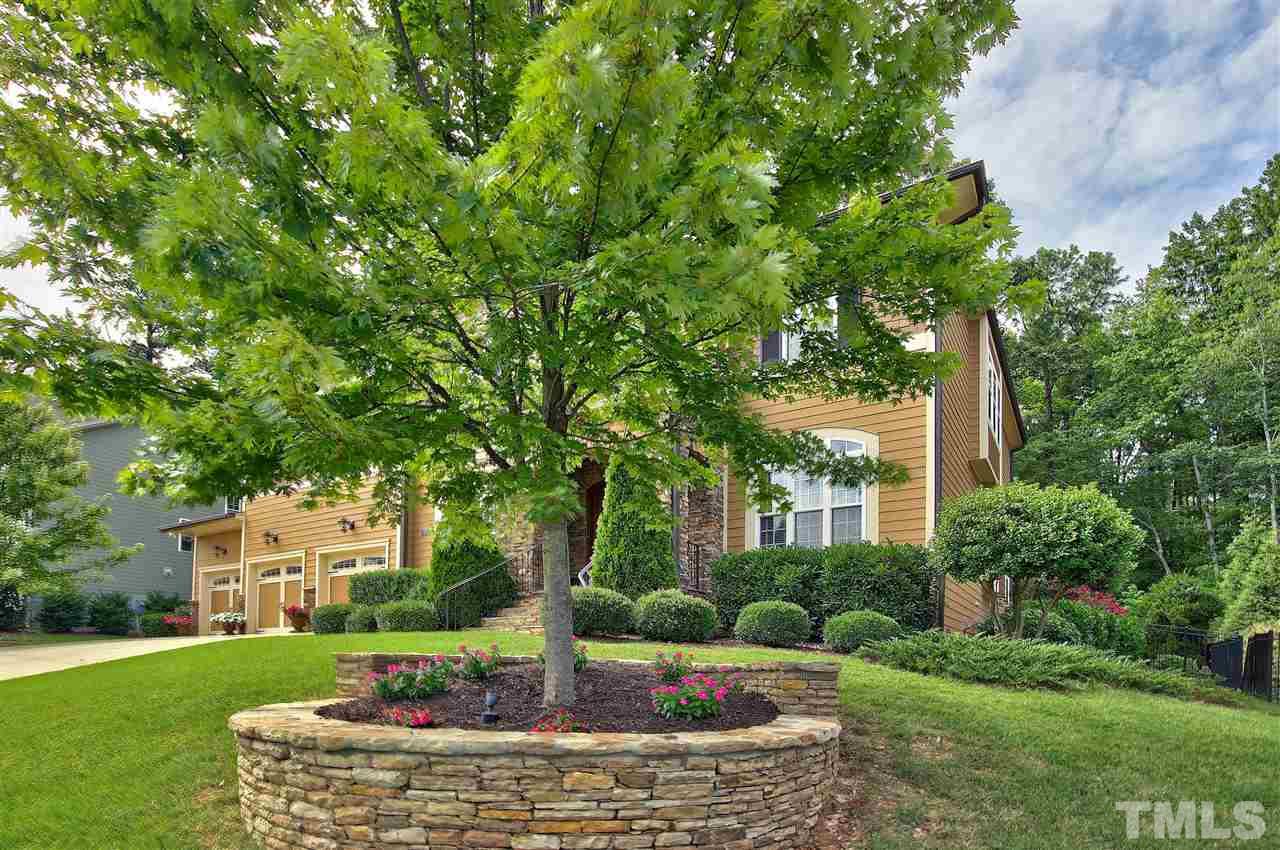 8604 Stonechase Drive Raleigh, NC 27613 - Photo 25 of 25 a front view of a house with a yard
