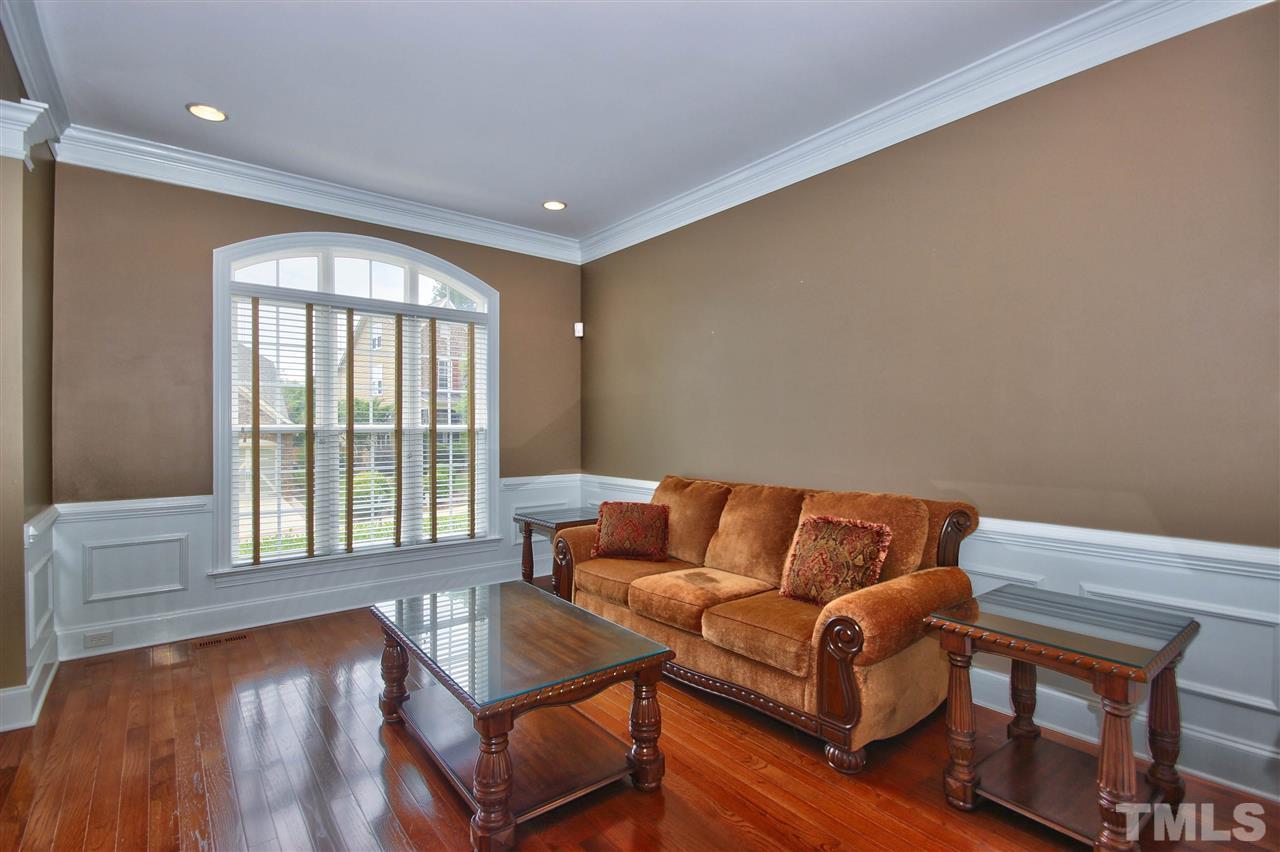 8604 Stonechase Drive Raleigh, NC 27613 - Photo 4 of 25 a living room with furniture and a window