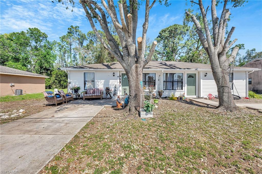 19133 Tangerine Road Fort Myers, FL 33967 - Photo 1 of 17 Ranch-style home featuring a front lawn