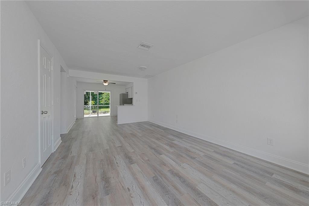 19133 Tangerine Road Fort Myers, FL 33967 - Photo 11 of 17 Unfurnished room with light wood-type flooring