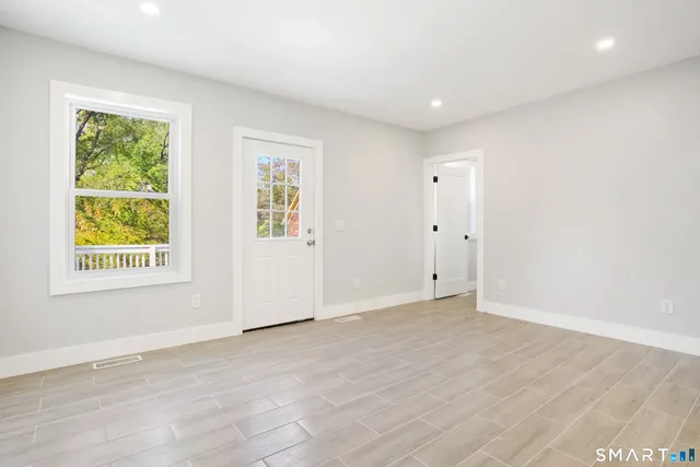 an empty room with windows