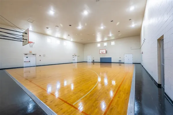 a view of a large room with a large screen tv