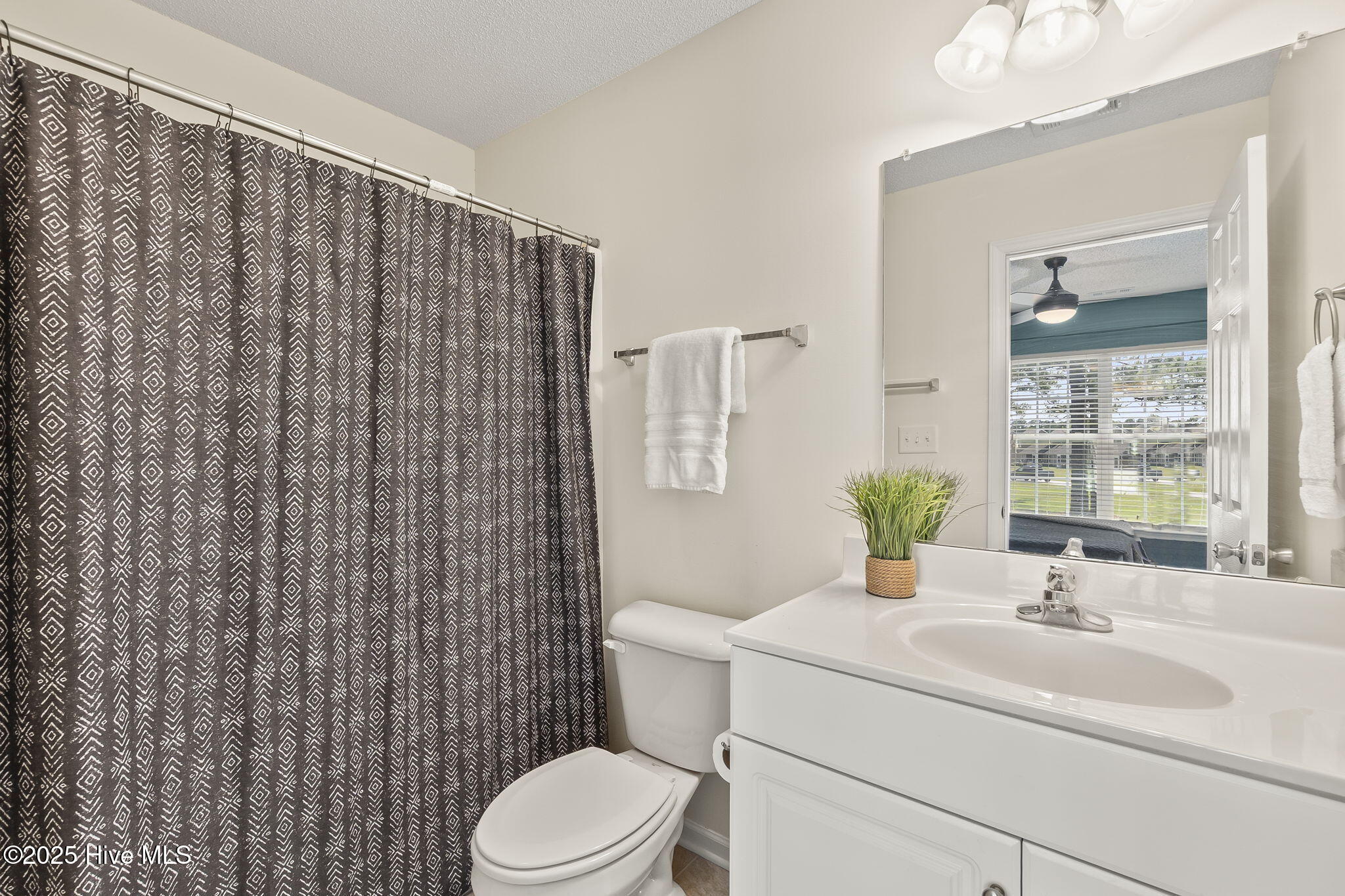 601 Peletier Loop Road Peletier, NC 28584 - Photo 25 of 33 En suite guest bedroom