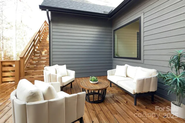 a view of that has two chairs and a table