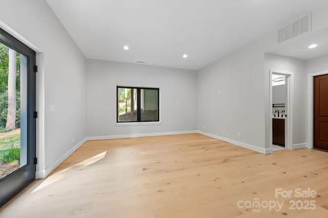 a view of an empty room and window