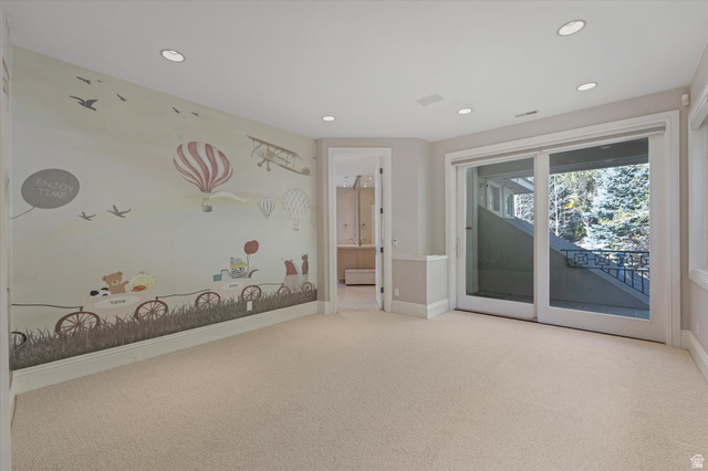 3222 Eagle View Circle Sandy, UT 84092 - Photo 27 of 60 Empty room featuring light colored carpet and recessed lighting
