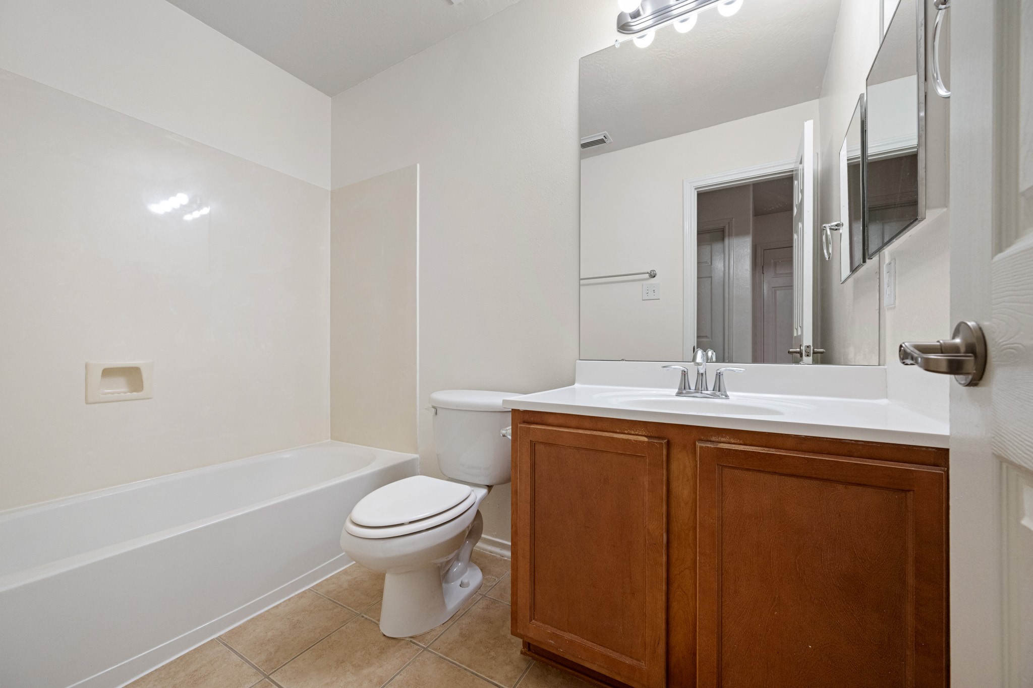 11938 Ramla Place Trail Houston, TX 77089 - Photo 27 of 28 Discover the convenience of this inviting full bathroom on the second floor, featuring modern fixtures and ample space for comfort and functionality.