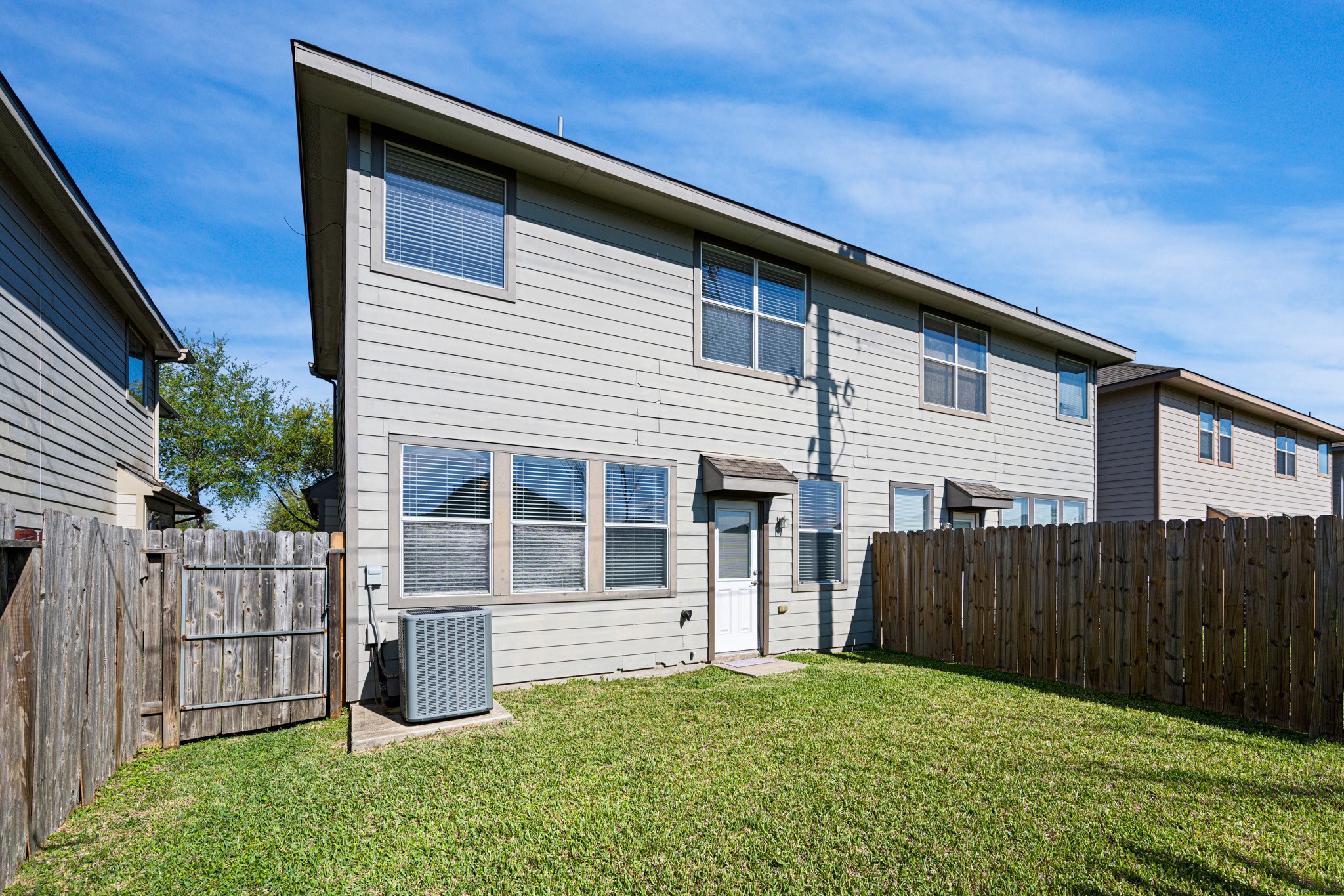 11938 Ramla Place Trail Houston, TX 77089 - Photo 28 of 28 Experience serene living with this home's spacious, sunlit backyard, perfect for relaxation and gatherings.