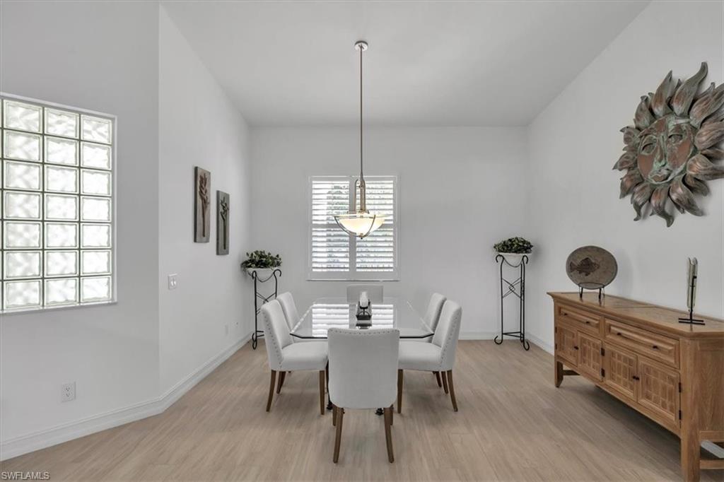 Undisclosed Address Naples, FL 34108 - Photo 16 of 44 a dining room with furniture and window