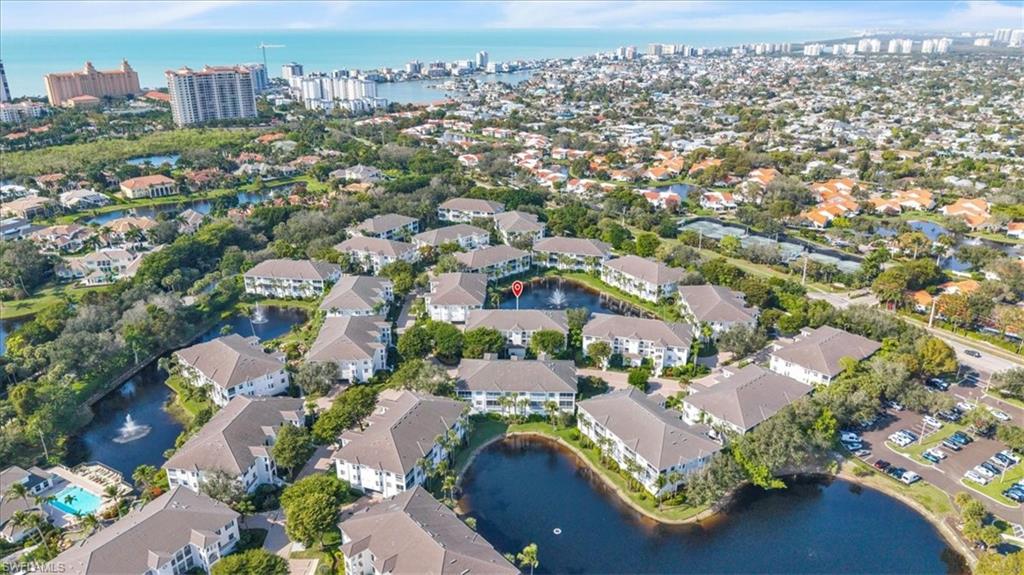 Undisclosed Address Naples, FL 34108 - Photo 29 of 44 an aerial view of residential houses with outdoor space