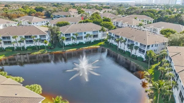 a view of a lake with a garden