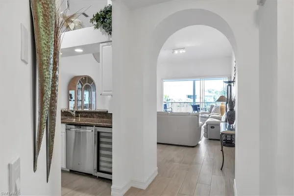 a view of living room and kitchen with furniture