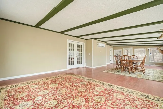 a view of a livingroom with furniture