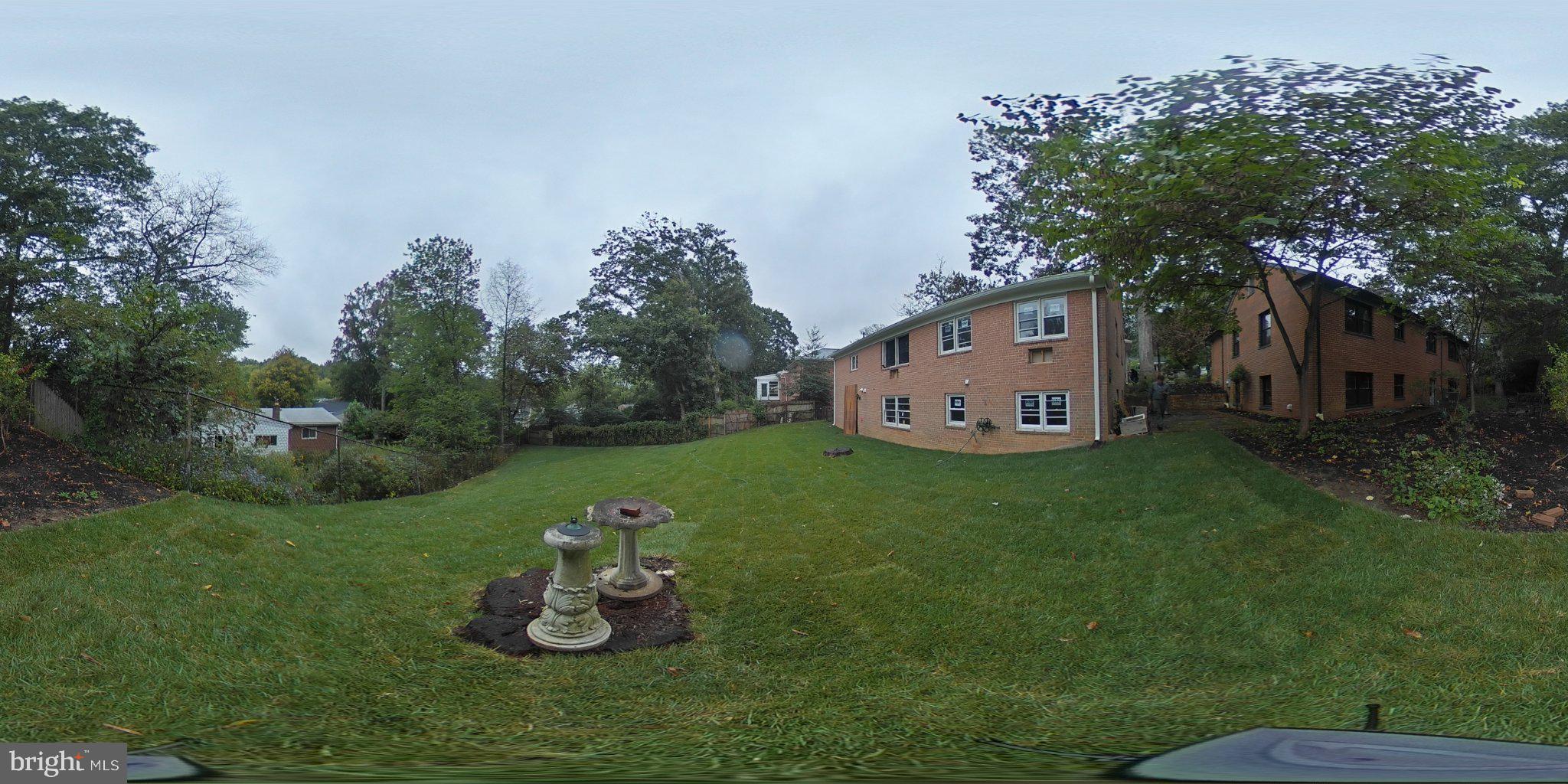 1409 Crestridge Drive Silver Spring, MD 20910 - Photo 26 of 33 Serene backyard with lush greenery.