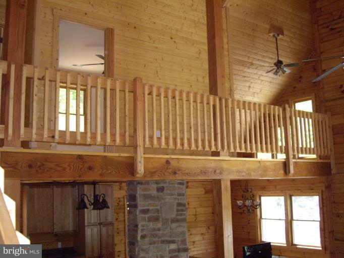 174 Mosby Springs Road Linden, VA 22642 - Photo 13 of 30 Upstairs balcony overlooks living room area.