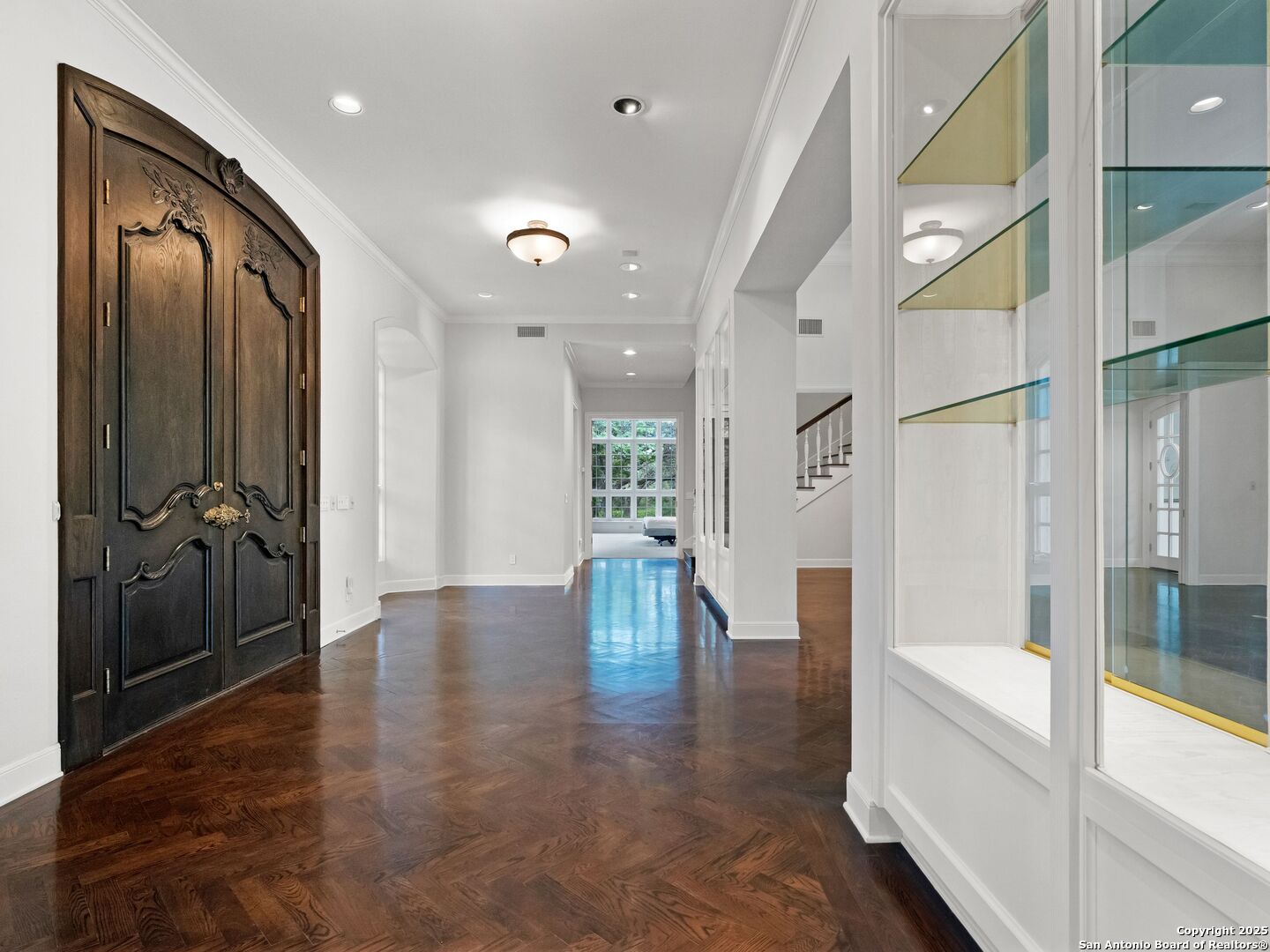 100 Tomahawk Trail Hill Country Village, TX 78232 - Photo 5 of 56 a view of an entryway with wooden floor and a bathroom