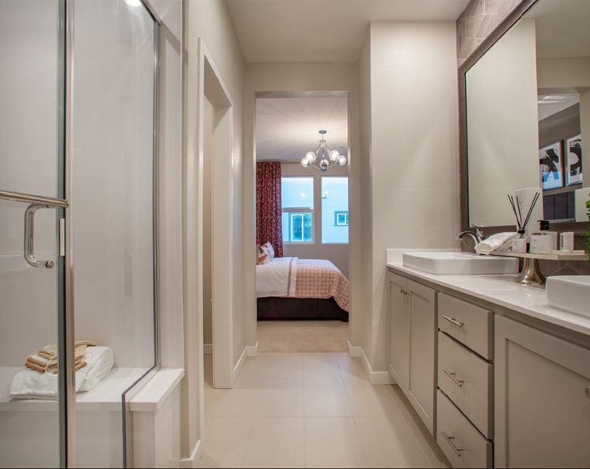 1778 Railway Circle Oakland, CA 94607 - Photo 5 of 6 a en suite spacious bathroom with a double vanity sink a mirror and shower