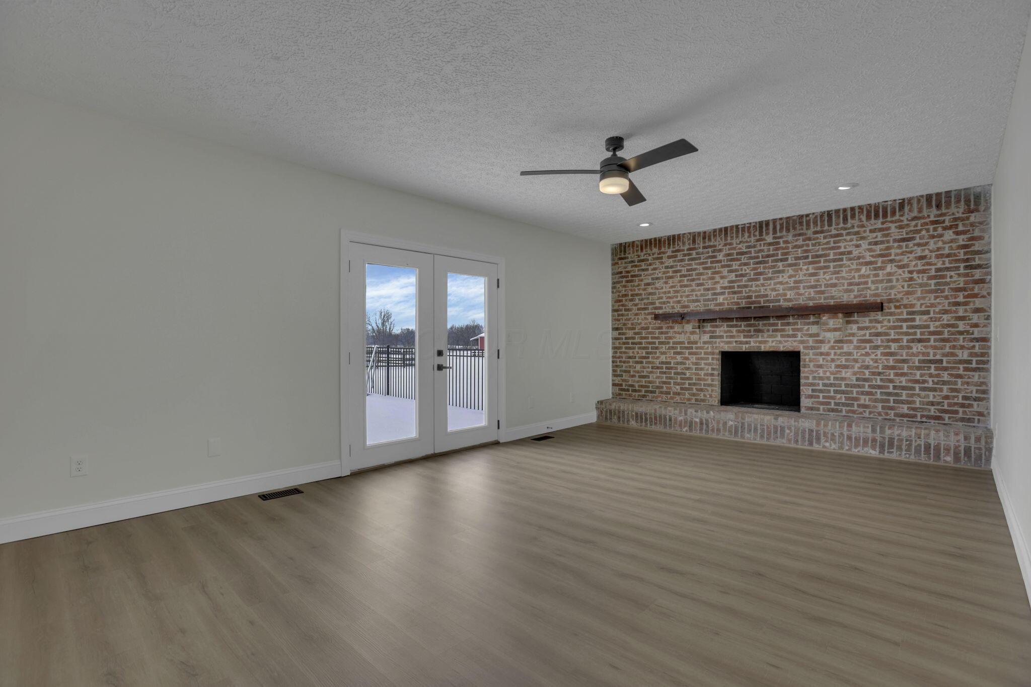 5273 Hayes Road Groveport, OH 43125 - Photo 30 of 89 Another view of the family room and stunning fireplace.