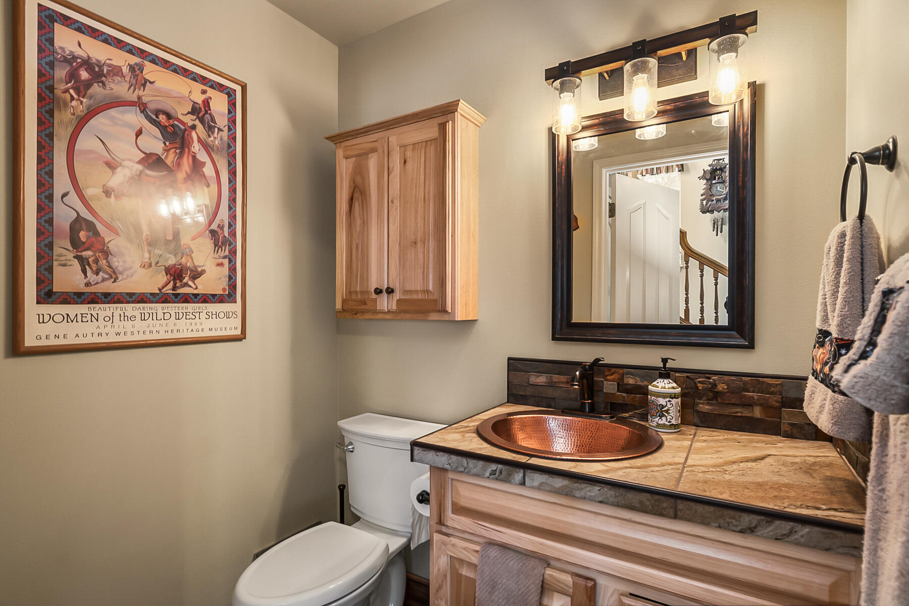 15730 Jackpine Road La Pine, OR 97739 - Photo 8 of 43 a bathroom with a toilet sink and mirror
