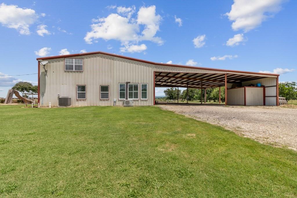 800 County Road 2807 Mabank, TX 75147 - Photo 4 of 40 a view of a house with backyard and porch