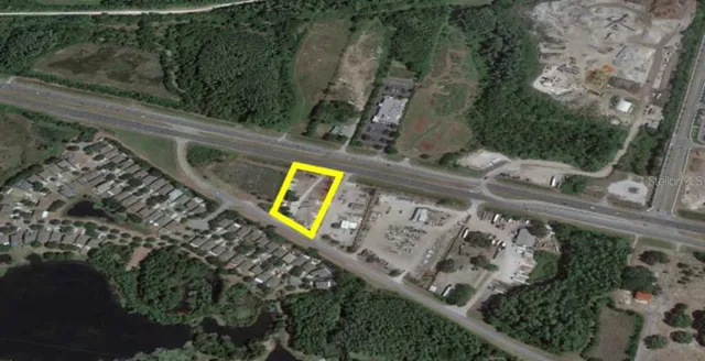 a view of a back yard with green space