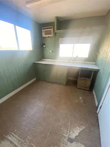 a view of a hallway with workspace