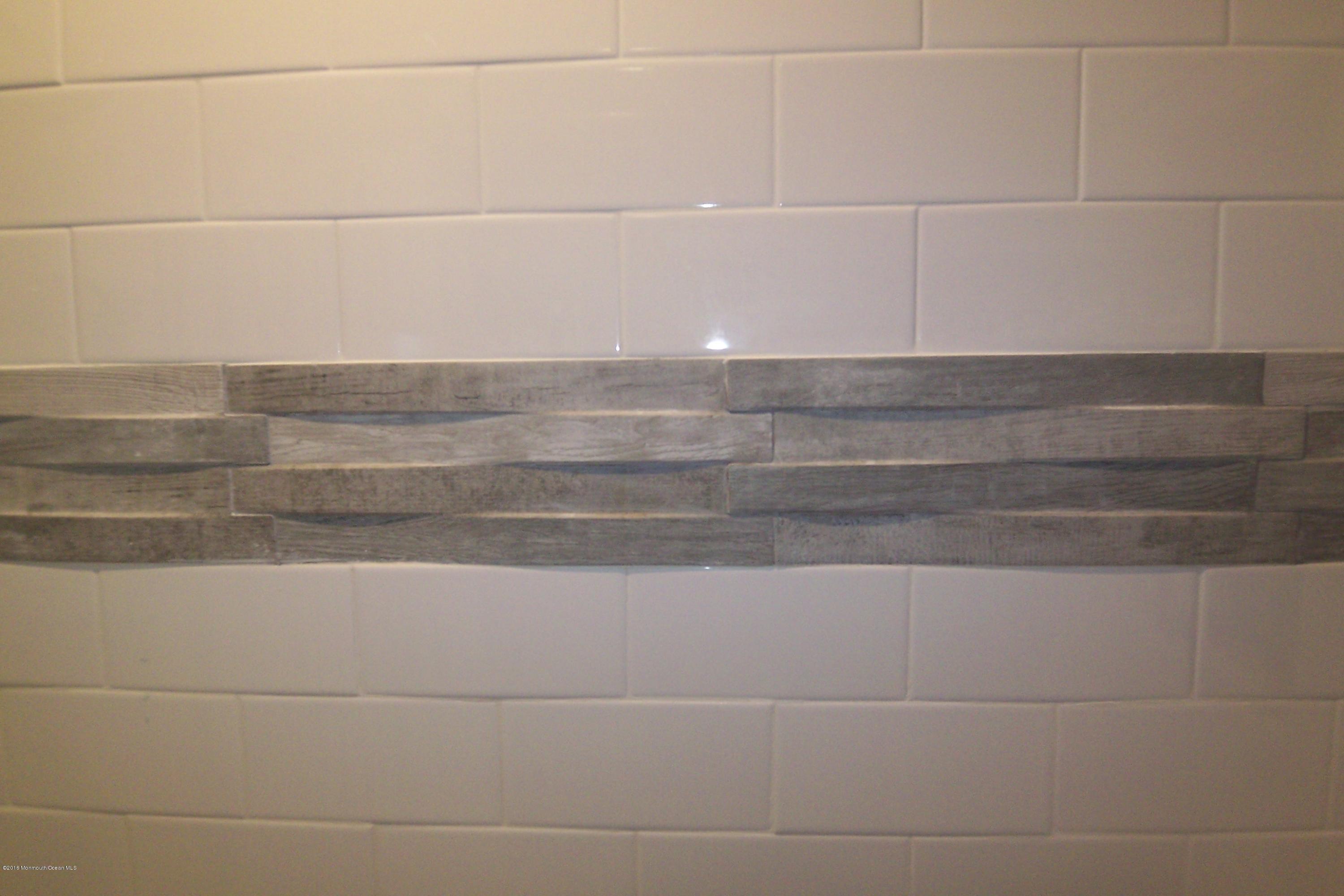 119 Meadowbrook Road Spring Lake Heights, NJ 07762 - Photo 11 of 24 a bathroom with a bathtub