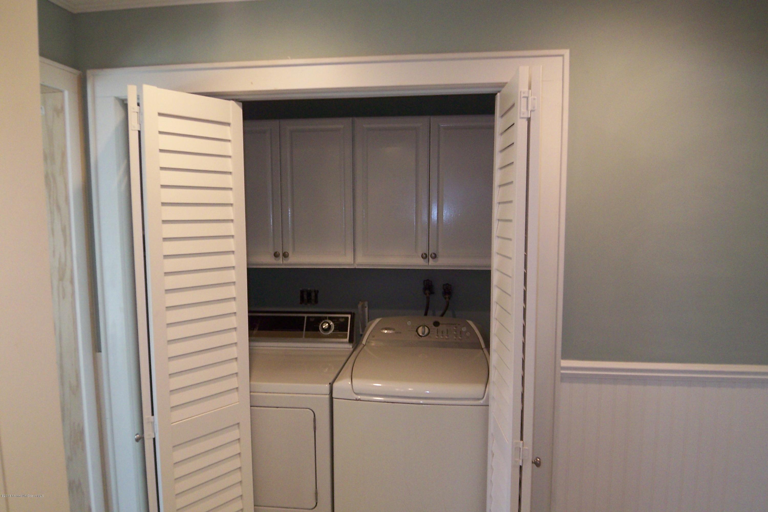 119 Meadowbrook Road Spring Lake Heights, NJ 07762 - Photo 12 of 24 a utility room with dryer and washer