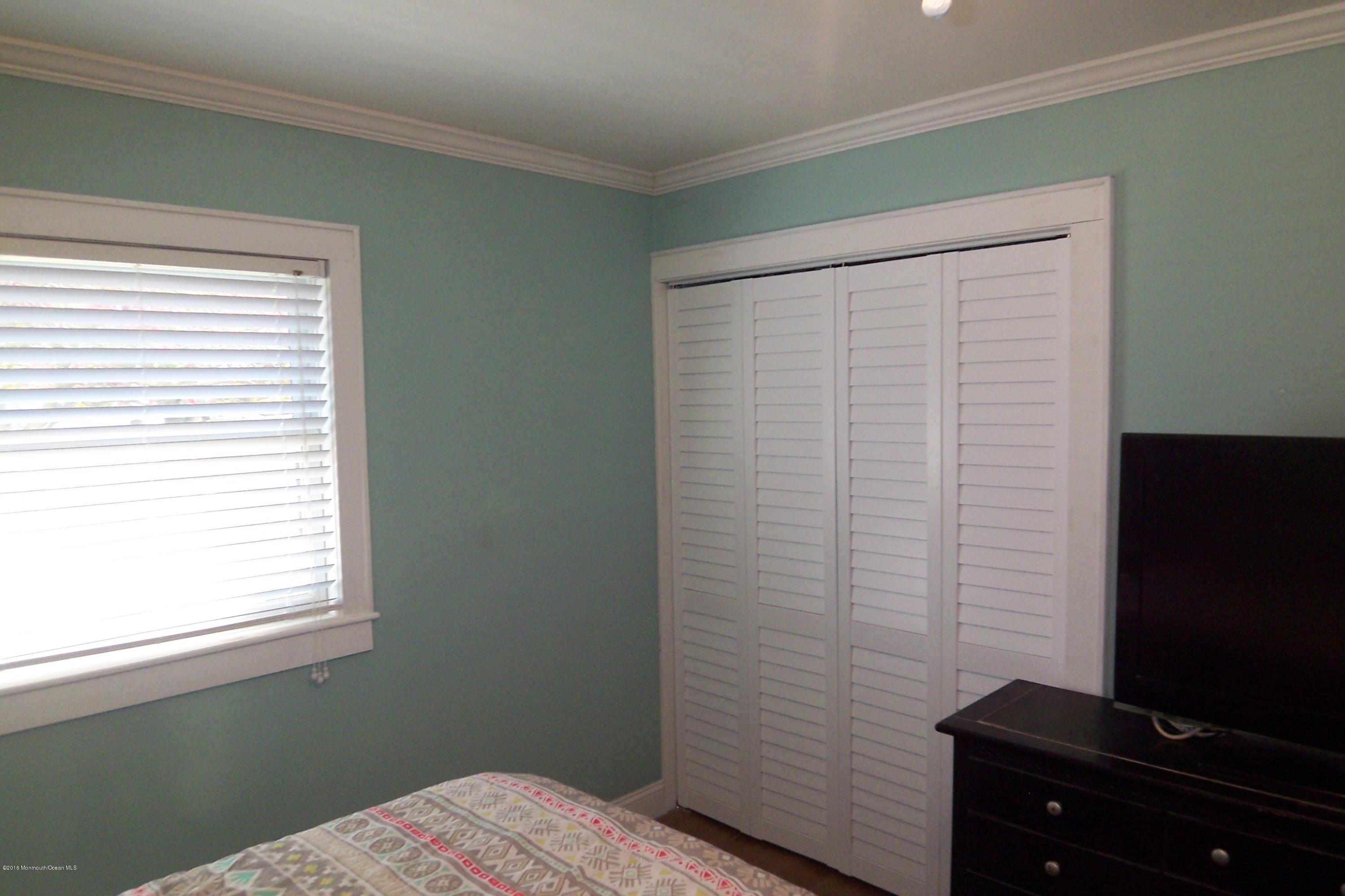 119 Meadowbrook Road Spring Lake Heights, NJ 07762 - Photo 14 of 24 a view of a bathroom with a window